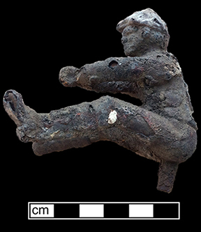 Cast iron jockey from 18M0609. 8cm x 8.25cm x 4.8cm